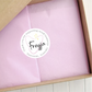 Custom logo sticker on pink packaging made in Australia 